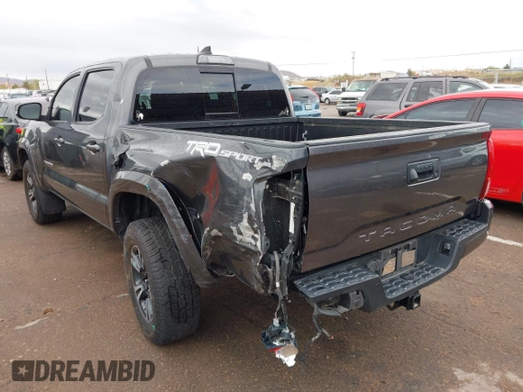 2018 Toyota Tacoma SR5 with VIN 3TMAZ5CN0JM061233, listed as a IAAI auction lot 41944668 with 94,314 mi miles and . Bid and sale history available at DreamBid. Image 14.