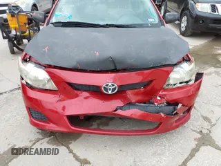 2009 Toyota Corolla with VIN 1NXBU40E89Z158636, listed as a IAAI auction lot 42142036 with 181,943 mi miles. Bid and sale history available at carsss.com. Image 6.