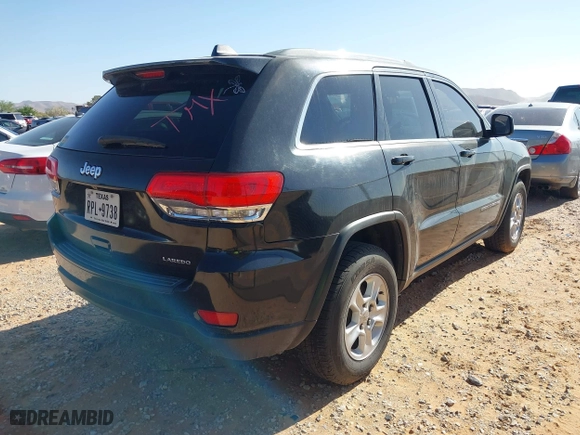 2014 Jeep Grand Cherokee Laredo with VIN 1C4RJEAG1EC348070, listed as a IAAI auction lot 41950898 with 129,883 mi miles. Bid and sale history available at carsss.com. Image 4.