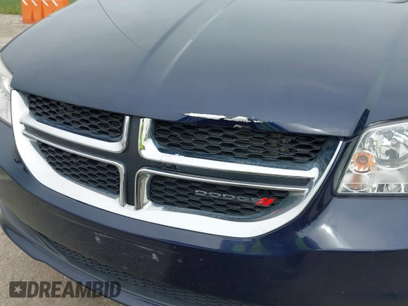 2015 Dodge Grand Caravan SXT with VIN 2C4RDGCG7FR524712, listed as a IAAI auction lot 41956063 with 111,144 mi miles and . Bid and sale history available at DreamBid. Image 18.