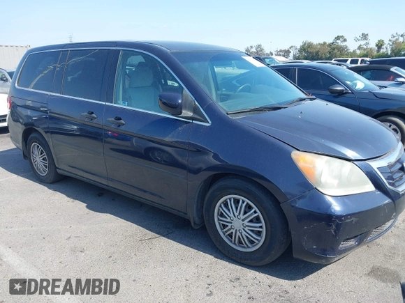 2008 Honda Odyssey LX with VIN 5FNRL38268B025424, listed as a IAAI auction lot 42432326 with 210,644 mi miles and . Bid and sale history available at DreamBid. Image 1.