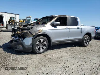2019 Honda Ridgeline RTL-E z VIN 5FPYK3F77KB015092, wystawiony jako Copart lot #48459345 z przebiegiem Nie podano mil oraz Szkody całkowita. Historia ofert i sprzedaży dostępna na DreamBid. Obrazek 1.