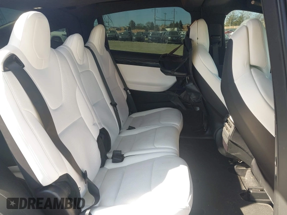 2018 Tesla Model X 75D with VIN 5YJXCAE45JF103828, listed as a IAAI auction lot 41698708 with 118,699 mi miles and . Bid and sale history available at carsss.com. Image 8.