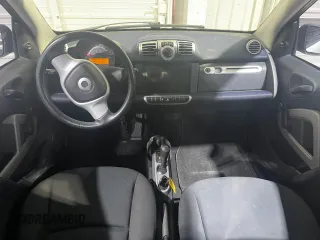2012 Smart fortwo Pure z VIN WMEEJ3BA5CK540092, wystawiony jako Copart lot #45064065 z przebiegiem 59 356 mil mil oraz Szkody całkowita. Historia ofert i sprzedaży dostępna na DreamBid. Obrazek 9.