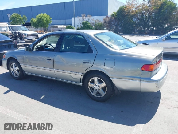 2001 Toyota Camry CE with VIN JT2BG22K810539653, listed as a IAAI auction lot 42236078 with 241,250 mi miles and . Bid and sale history available at DreamBid. Image 3.