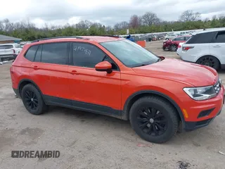 2018 Volkswagen Tiguan S z VIN 3VV0B7AX4JM124500, wystawiony jako IAAI lot #41974671 z przebiegiem 76 970 mil mil oraz . Historia ofert i sprzedaży dostępna na DreamBid. Obrazek 13.