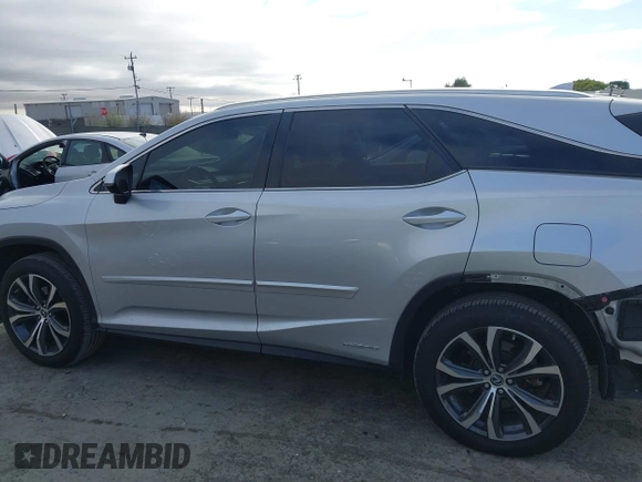 2018 Lexus RX 450hL Premium с VIN JTJDGKCA4J2001622, выставлен на аукционе IAAI как лот 42779010 с пробегом 71 969 миль миль и . История ставок и продаж доступна на DreamBid. Изображение 15.