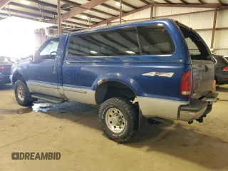 1999 Ford Super Duty F-250 XL with VIN 1FTNF21F2XEB09589, listed as a Copart auction lot 50700795 with 292,135 mi miles and Salvage Title. Bid and sale history available at carsss.com. Image 2.