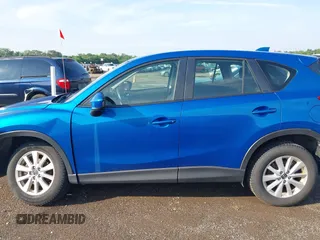 2014 Mazda CX-5 Sport z VIN JM3KE4BE7E0351982, wystawiony jako IAAI lot #42767499 z przebiegiem 154 774 mil mil oraz . Historia ofert i sprzedaży dostępna na DreamBid. Obrazek 14.