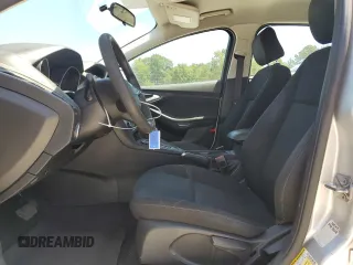 2017 Ford Focus SE with VIN 1FADP3F27HL223918, listed as a Copart auction lot 57464685 with 134,253 mi miles and Salvage title. Bid and sale history available at DreamBid. Image 7.