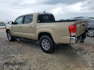 2017 Toyota Tacoma SR5 with VIN 5TFAZ5CN2HX030781, listed as a Copart auction lot 53957535 with 105,606 mi miles and Salvage Title. Bid and sale history available at DreamBid. Image 2.