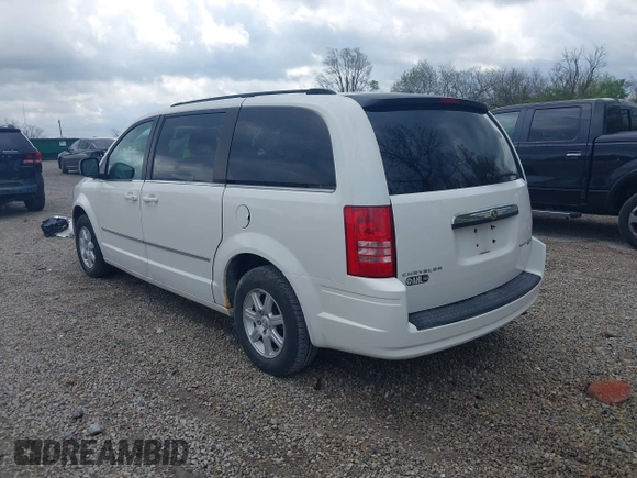 2010 Chrysler Town & Country Touring with VIN 2A4RR5D19AR432617, listed as a IAAI auction lot 42059653 with 189,582 mi miles. Bid and sale history available at carsss.com. Image 3.