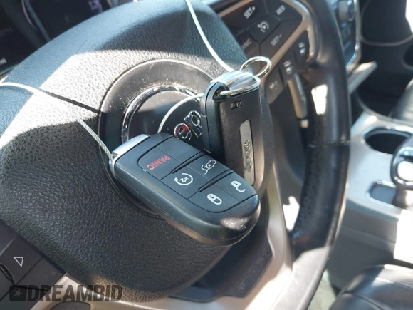 2015 Jeep Grand Cherokee Summit with VIN 1C4RJFJGXFC125131, listed as a IAAI auction lot 42475017 with 128,166 mi miles and . Bid and sale history available at DreamBid. Image 11.
