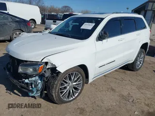 2018 Jeep Grand Cherokee Summit with VIN 1C4RJFJT4JC212819, listed as a IAAI auction lot 41975614 with 88,112 mi miles and . Bid and sale history available at DreamBid. Image 2.