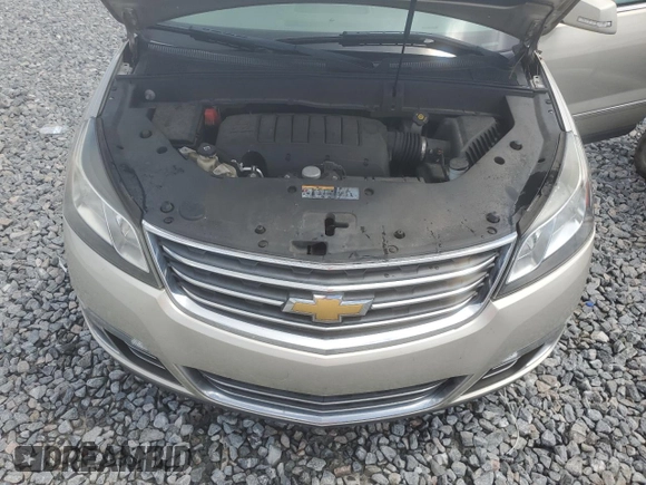 2015 Chevrolet Traverse LTZ z VIN 1GNKRJKD8FJ269524, wystawiony jako Copart lot #56700805 z przebiegiem 110 605 mil mil oraz Szkoda całkowita • Salvage title. Historia ofert i sprzedaży dostępna na DreamBid. Obrazek 12.