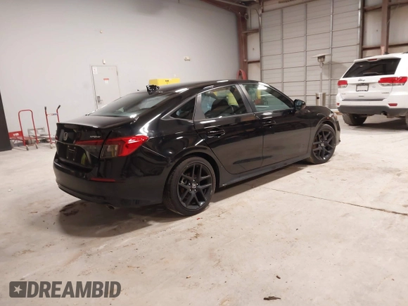 2024 Honda Civic Sport with VIN 2HGFE2F59RH519889, listed as a IAAI auction lot 41598192 with 7,451 mi miles and . Bid and sale history available at DreamBid. Image 4.
