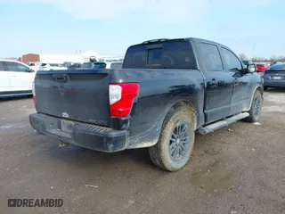 2018 Nissan Titan SV with VIN 1N6AA1E64JN529022, listed as a IAAI auction lot 41127756 with 150,166 mi miles. Bid and sale history available at carsss.com. Image 4.