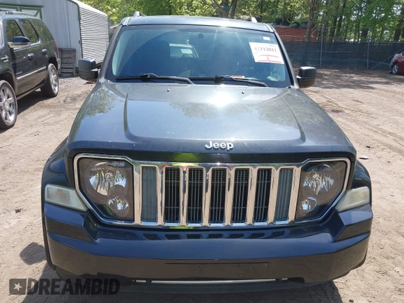 2011 Jeep Liberty Sport 70th Anniversary with VIN 1J4PN2GK9BW571404, listed as a IAAI auction lot 42112011 with 159,020 mi miles and . Bid and sale history available at DreamBid. Image 6.
