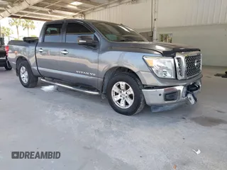 2018 Nissan Titan SV with VIN 1N6AA1E69JN534796, listed as a IAAI auction lot 42295623 with 196,929 mi miles and . Bid and sale history available at DreamBid. Image 1.