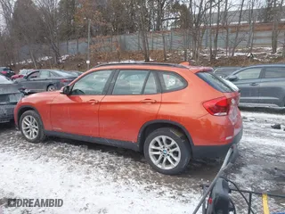 2015 BMW X1 xDrive28i with VIN WBAVL1C51FVY33650, listed as a IAAI auction lot 41400985 with 132,484 mi miles. Bid and sale history available at carsss.com. Image 15.