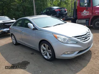 2012 Hyundai Sonata Limited z VIN 5NPEC4AB0CH451960, wystawiony jako IAAI lot #42489513 z przebiegiem 174 310 mil mil oraz . Historia ofert i sprzedaży dostępna na DreamBid. Obrazek 1.