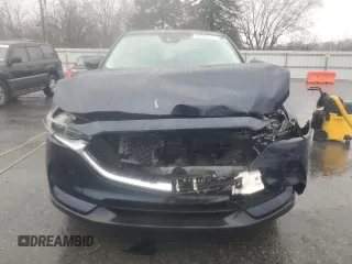 2019 Mazda CX-5 Grand Touring with VIN JM3KFBDM1K0676645, listed as a Copart auction lot 47938715 with 62,106 mi miles and Salvage Title. Bid and sale history available at carsss.com. Image 5.