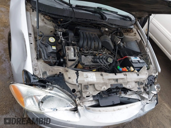 2003 Ford Taurus SE Standard with VIN 1FAFP53273G132268, listed as a IAAI auction lot 41790335 with 202,724 mi miles. Bid and sale history available at carsss.com. Image 10.