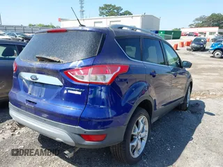 2014 Ford Escape Titanium with VIN 1FMCU0JX2EUB78596, listed as a IAAI auction lot 41994873 with 96,437 mi miles. Bid and sale history available at carsss.com. Image 4.