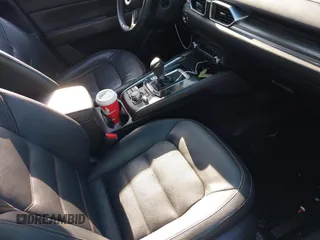 2019 Mazda CX-5 Grand Touring with VIN JM3KFBDM7K0525650, listed as a IAAI auction lot 42032757 with 65,530 mi miles and . Bid and sale history available at DreamBid. Image 5.
