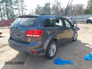 2015 Dodge Journey SXT with VIN 3C4PDCBG0FT733952, listed as a IAAI auction lot 41521687 with 80,974 mi miles and . Bid and sale history available at DreamBid. Image 4.