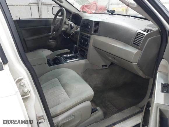 2006 Jeep Grand Cherokee Laredo with VIN 1J8GR48K06C163877, listed as a IAAI auction lot 41971240 with 250,544 mi miles. Bid and sale history available at carsss.com. Image 5.