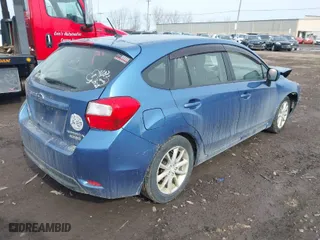 2014 Subaru Impreza Wagon 2.0i Premium with VIN JF1GPAC65E8261560, listed as a IAAI auction lot 41777852 with 145,880 mi miles. Bid and sale history available at carsss.com. Image 4.