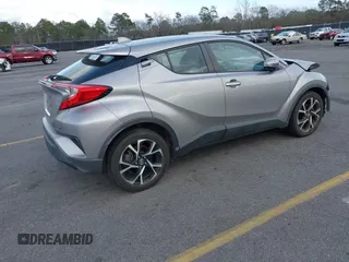 2019 Toyota C-HR XLE with VIN NMTKHMBX7KR078292, listed as a IAAI auction lot 41705966 with 104,352 mi miles. Bid and sale history available at carsss.com. Image 4.