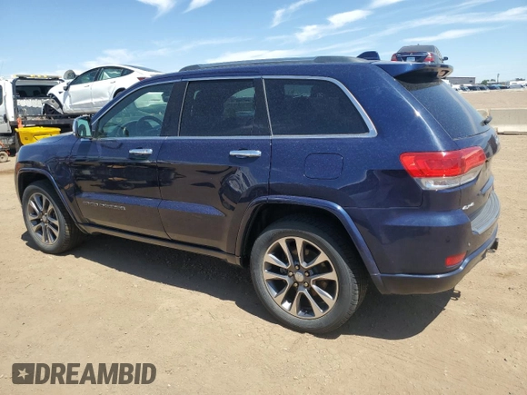 2017 Jeep Grand Cherokee Overland with VIN 1C4RJFCG0HC943029, listed as a Copart auction lot 63073985 with 100,550 mi miles and Clean title. Bid and sale history available at DreamBid. Image 2.