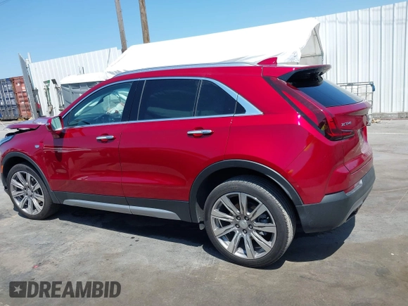 2021 Cadillac XT4 FWD Premium Luxury z VIN 1GYFZCR48MF004849, wystawiony jako IAAI lot #42131896 z przebiegiem 9 864 mil mil oraz . Historia ofert i sprzedaży dostępna na DreamBid. Obrazek 14.