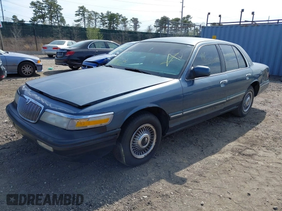 1996 Mercury Grand Marquis GS with VIN 2MELM74W8TX697141, listed as a IAAI auction lot 42082750 with 138,963 mi miles and . Bid and sale history available at DreamBid. Image 2.