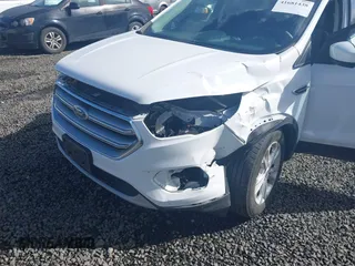 2017 Ford Escape SE with VIN 1FMCU9G97HUE98112, listed as a IAAI auction lot 41681438 with 71,837 mi miles. Bid and sale history available at carsss.com. Image 6.