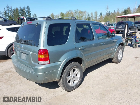 2006 Ford Escape Hybrid with VIN 1FMCU96H66KC08721, listed as a IAAI auction lot 42043128 with 58,394 mi miles and . Bid and sale history available at DreamBid. Image 4.