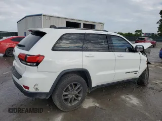 2017 Jeep Grand Cherokee 75th Anniversary with VIN 1C4RJEAG3HC696232, listed as a Copart auction lot 57362055 with 105,440 mi miles and Salvage title. Bid and sale history available at DreamBid. Image 3.