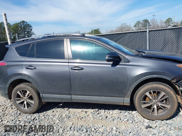 2018 Toyota RAV4 XLE with VIN 2T3WFREV2JW450019, listed as a IAAI auction lot 41704084 with 257,737 mi miles. Bid and sale history available at carsss.com. Image 13.