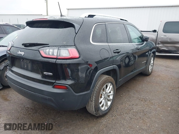 2019 Jeep Cherokee Latitude with VIN 1C4PJLCB4KD220229, listed as a IAAI auction lot 41179101 with 63,099 mi miles and . Bid and sale history available at DreamBid. Image 4.