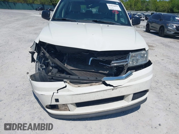 2015 Dodge Journey SE z VIN 3C4PDCAB7FT572716, wystawiony jako IAAI lot #42010091 z przebiegiem 186 489 mil mil oraz . Historia ofert i sprzedaży dostępna na DreamBid. Obrazek 6.