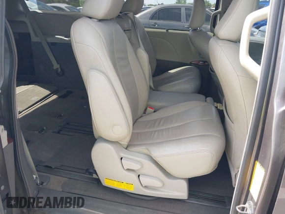 2014 Toyota Sienna XLE with VIN 5TDYK3DC0ES513076, listed as a IAAI auction lot 42724629 with 154,019 mi miles and . Bid and sale history available at DreamBid. Image 8.