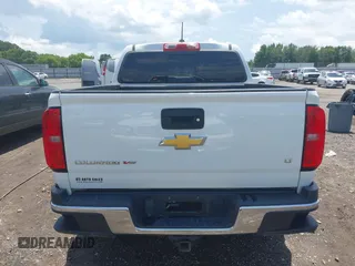 2018 Chevrolet Colorado 4WD LT z VIN 1GCGTCEN3J1108460, wystawiony jako IAAI lot #42543935 z przebiegiem 81 203 mil mil oraz . Historia ofert i sprzedaży dostępna na DreamBid. Obrazek 16.