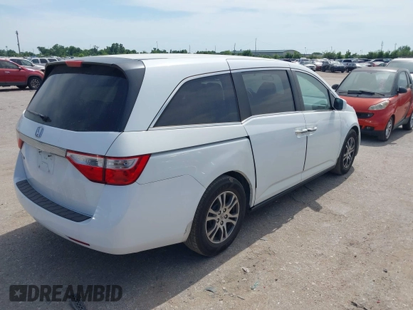 2013 Honda Odyssey EX z VIN 5FNRL5H44DB024764, wystawiony jako IAAI lot #42256598 z przebiegiem 169 708 mil mil oraz . Historia ofert i sprzedaży dostępna na DreamBid. Obrazek 4.