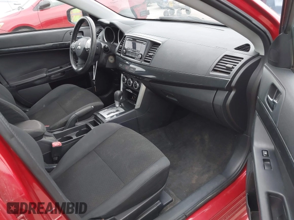 2016 Mitsubishi Lancer ES with VIN JA32U2FU4GU008882, listed as a IAAI auction lot 41600017 with 134,772 mi miles. Bid and sale history available at carsss.com. Image 5.
