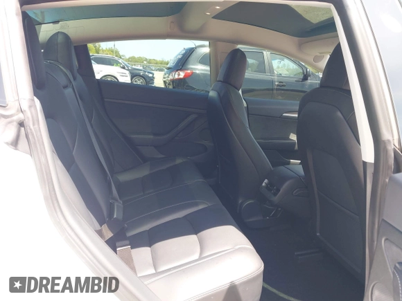 2022 Tesla Model 3 Long Range z VIN 5YJ3E1EB4NF163001, wystawiony jako IAAI lot #42211705 z przebiegiem 53 487 mil mil oraz . Historia ofert i sprzedaży dostępna na DreamBid. Obrazek 8.
