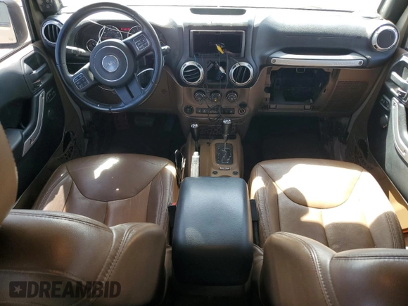 2016 Jeep Wrangler Unlimited Rubicon z VIN 1C4HJWFGXGL236560, wystawiony jako Copart lot #57528355 z przebiegiem 64 634 mil mil oraz Szkoda całkowita • Salvage title. Historia ofert i sprzedaży dostępna na DreamBid. Obrazek 8.