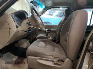 2003 Ford Explorer Sport Trac XLS с VIN 1FMZU67E53UB29697, выставлен на аукционе Copart как лот 57676915 с пробегом 218 351 миль миль и Чистый • Clean title. История ставок и продаж доступна на DreamBid. Изображение 7.