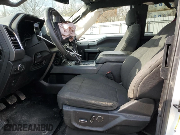 2016 Ford F-150 XLT with VIN 1FTFX1EG2GKF77712, listed as a Copart auction lot 45689545 with 211,303 mi miles and Salvage title. Bid and sale history available at DreamBid. Image 7.